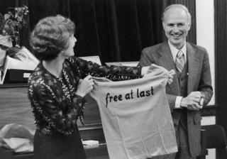 Outgoing UUA President Rev. Dr. Robert Nelson West receiving a parting gift from UUA staff members at a farewell reception in June 1977.