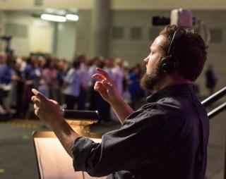 Zachary Welch interprets a worship service in American Sign Language at GA 2019.