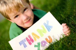 Boy with Thank You sign