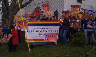 UUs rallied for marriage equality on the lawn of the First Universalist Church of Pittsfield, Maine, which had its rainbow flag vandalized prior to the November 6 election.