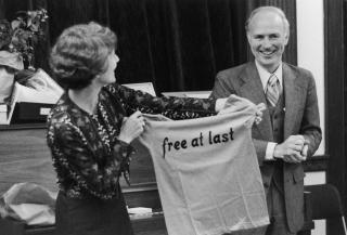 Outgoing UUA President Rev. Dr. Robert Nelson West receiving a parting gift from UUA staff members at a farewell reception in June 1977.