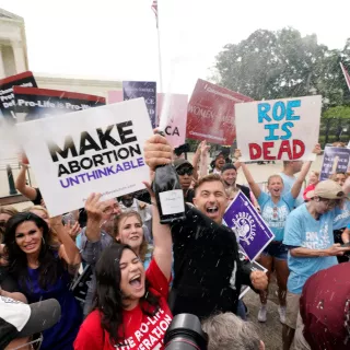 A celebration outside the Supreme Court, Friday, June 24, 2022, in Washington