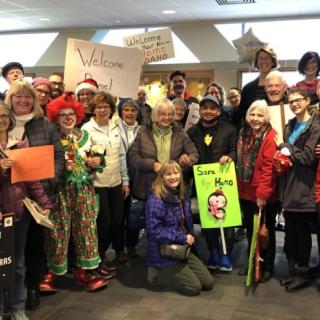 Members of the Boise UU Fellowship’s Refugee and Immigrant Ministry Team welcome Romel (in ball cap) at the airport upon his arrival from a Louisiana detention facility.