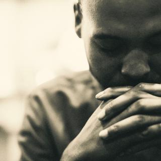 African American man praying