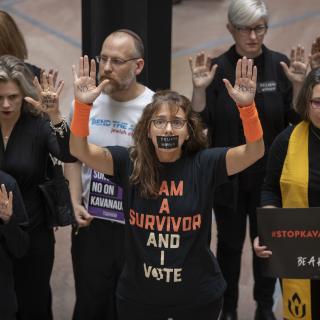 Protesters, including UUA President Susan Frederick-Gray, demonstrate in the Hart Senate Office Building on Sept. 27, 2018 
