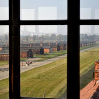view of Auschwitz barracks from window