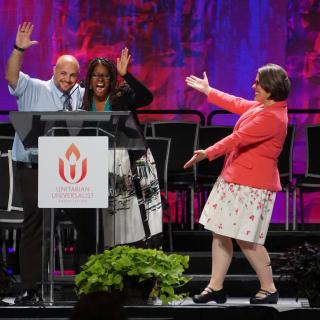 From right: UUA President Susan Frederick-Gray presents Co-Moderators Elandria Williams and Mr. Barb Greve during the General Assembly Opening Celebration in 2019.