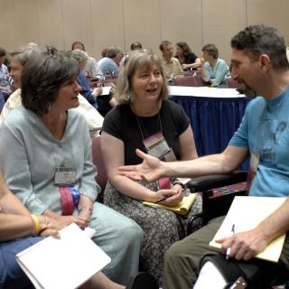 Several hundred congregational presidents met in small groups at GA in 2007.
