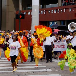 The "Love Resists" second line leaves the General Assembly convention center