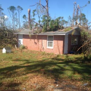 Storm damage to one of the buildings of the Panama City, Florida, UU fellowship