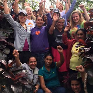Travelers from the U.S. on a UU College of Social Justice trip to Nicaragua celebrate their new friendship with women from the Los Llanos CoopeMujer cooperative and the Esteli offices of Fundación Entre Mujeres.