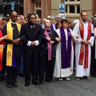 About sixty clergy including Unitarian Universalist Association President Susan Frederick-Gray marched in Charlottesville, Virginia, on August 12 in an interfaith, nonviolent protest against a white supremacist rally.