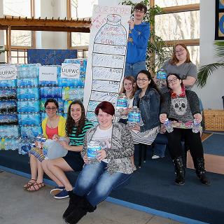 Youth from the Unitarian Universalist Fellowship of Wayne County in Wooster, Ohio, are taking 3,200 bottles of water they collected to Flint, Michigan, this month. 
