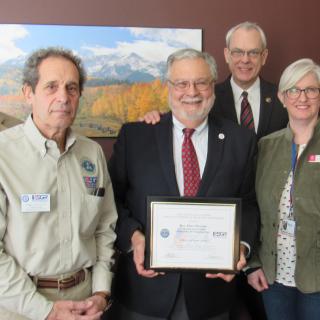 UUA staff honored for supporting employees in reserve military. At the award presentation: the Rev. Scott Tayler, Paul Desmond, UUA President Peter Morales, the Rev. Harlan Limpert, the Rev. Megan Foley, and the Rev. David Pyle. 