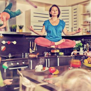 photo illustration of meditating woman in kitchen surrounded by children and swirling objects in mid-air