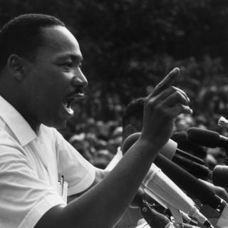 The Rev. Dr. Martin Luther King Jr. speaks at a Mississippi rally in 1966.