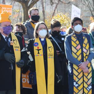 The Rev. David Carl Olson, the Rev. Susan Frederick-Gray, the Rev. Abhi Janamanchi, and UUA partnerships and coalitions manager Susan Leslie and others at the Moral March in Washington DC in December 2021