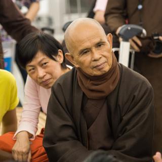 Thich Nhat Hanh listening deeply to his students in Hong Kong, 2013.