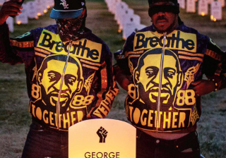 Candlelight vigil honors George Floyd and other people who were killed by police.