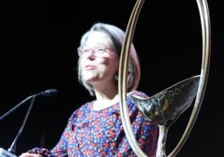 Susan Frederick-Grey in GA closing ceremony, Portland 2022. UU Chalice