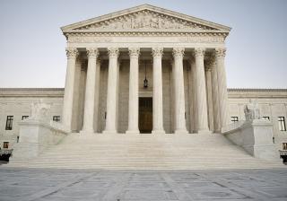 U.S. Supreme Court building - a neoclassical building with front facade, with pillars and steps