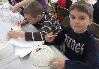 Children from First Parish in Norwell makes bowls