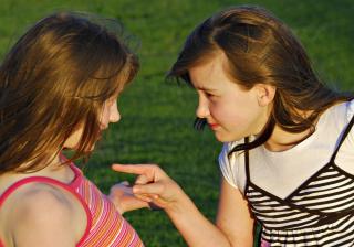 Two girls arguing