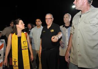 The Rev. Susan Frederick-Gray (left), a lead plaintiff in a lawsuit settled in January 2018 against Maricopa County Sheriff Joe Arpaio (center), leaves Arpaio's Maricopa County "tent city" jail after touring it with a religious delegation in June 2012.