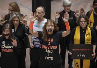 Protesters, including UUA President Susan Frederick-Gray, demonstrate in the Hart Senate Office Building on Sept. 27, 2018 