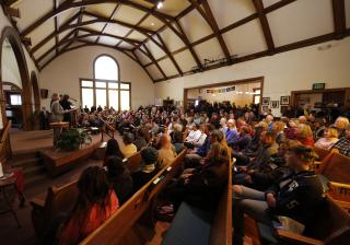 A vigil is held at Unitarian Universalist Church to mark the Friday shooting at a Planned Parenthood clinic Saturday, Nov. 28, 2015, in Colorado Springs, Colo.