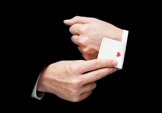Ace Card hidden under sleeve - Stock image