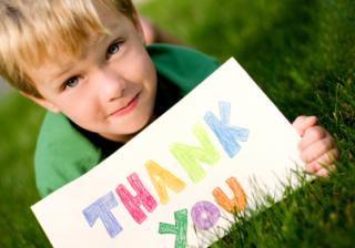 Boy with Thank You sign