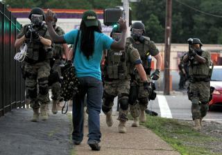 Heavily armed police in Ferguson, Mo., in August 2014.