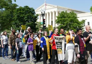 Interfaith activists, including UUA President Susan Frederick-Gray marched in the first day of the Poor People’s Campaign 40 Days of Action in Washington, D.C., where they were arrested by U.S. Capitol Police for blocking a road. 