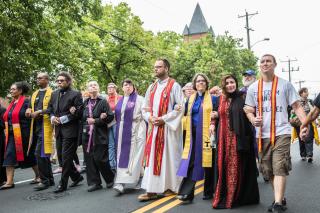 Marching with clergy in Charlottesville, Virginia, in an interfaith, nonviolent protest against a white supremacist rally. 