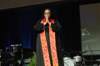 Rev. Dr. Sofía Betancourt in red and yellow stole