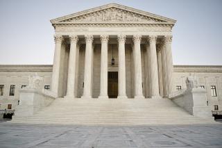 U.S. Supreme Court building - a neoclassical building with front facade, with pillars and steps