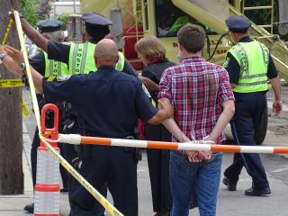 Connor Wertz, 17, a member of the UU Church of Haverhill, Massachusetts, is arrested June 29 for civil disobedience during a climate justice protest interrupting the construction of the West Roxbury lateral pipeline in Boston. 
