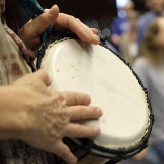 Drumming at the Covenant of UU Pagans summer solstice celebration at GA 2018.