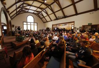 A vigil is held at Unitarian Universalist Church to mark the Friday shooting at a Planned Parenthood clinic Saturday, Nov. 28, 2015, in Colorado Springs, Colo.