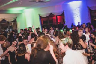 Young people dance at a prom for LGBTQ youth in Newport, Rhode Island