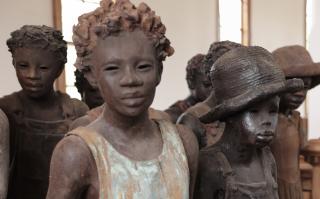 At Whitney Plantation, “The Children of Whitney” sculptures by artist Woodrow Nash represent former slaves who were emancipated as children and later shared their recollections of slavery with the Federal Writers’ Project. 