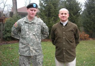 U.S. Army Sgt. Christian Isely (shown here as a Private in 2006) with his father, retired U.S. Navy Capt. Chris Isely, a member of the Unitarian Church of Evanston, Ill.