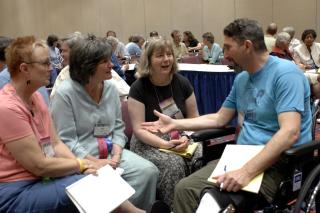 Several hundred congregational presidents met in small groups at GA in 2007.