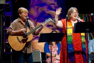 Kiya Heartwood and the Rev. Kimberley Debus perform their new song, "Are All Called"—the theme of GA 2018—during the Opening Celebration's worship service.