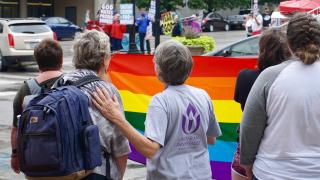Unitarian Universalists affirm LGBT lives across the street from a Westboro Baptist Church protest of the UUA General Assembly in Kansas City, June 21, 2018.
