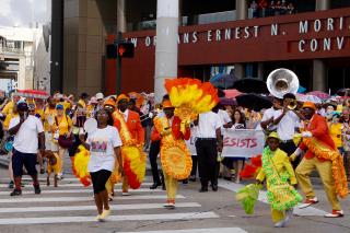 The "Love Resists" second line leaves the General Assembly convention center