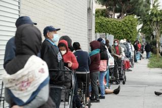 Food bank clients line up to make use of a COVID-19 emergency food bank at First Unitarian Los Angeles, May 2020.