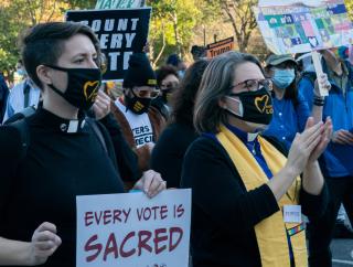 The Rev. Abbey Tennis (left), of First Unitarian Church of Philadelphia, and UUA President Susan Frederick-Gray march  in a November 4 “Count Every Vote” rally  in Philadelphia