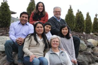 The Rev. Peter Morales (top right) and Phyllis Morales (bottom right) with Juan de Dios García (bottom left) and Maria Osorio Chen (second from left) and their family.